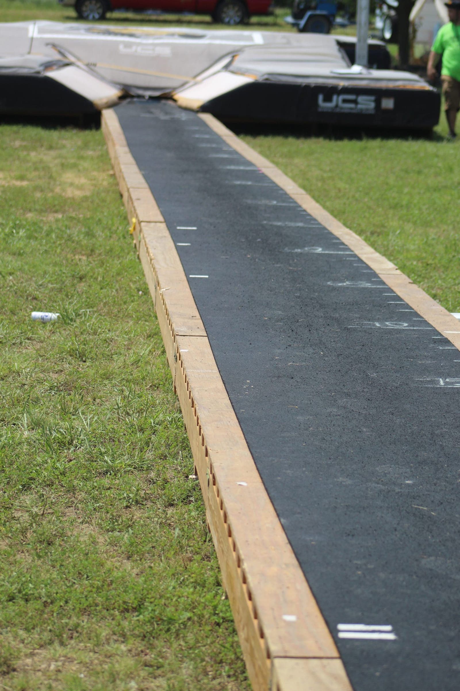 Pole vault runway leading to the landing pit at Wichita Vault Academy